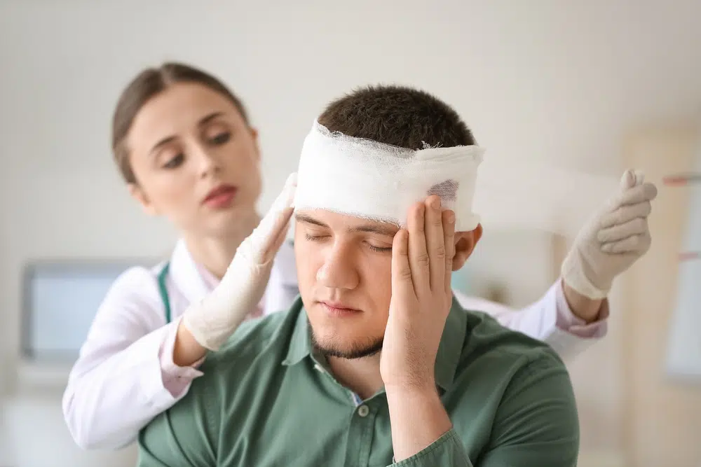 Doctor Applying Bandage Photo of Doctor Applying Bandage